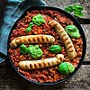 Foto Menüteller mit veganen Bratwürstchen