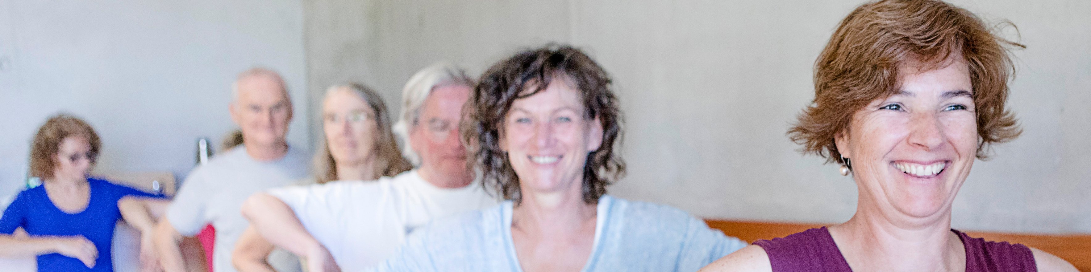 Teilnehmende eines Qigong-Kurses